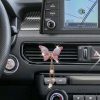 clip_de_ventilacion_de_automovil_mariposa_colgante